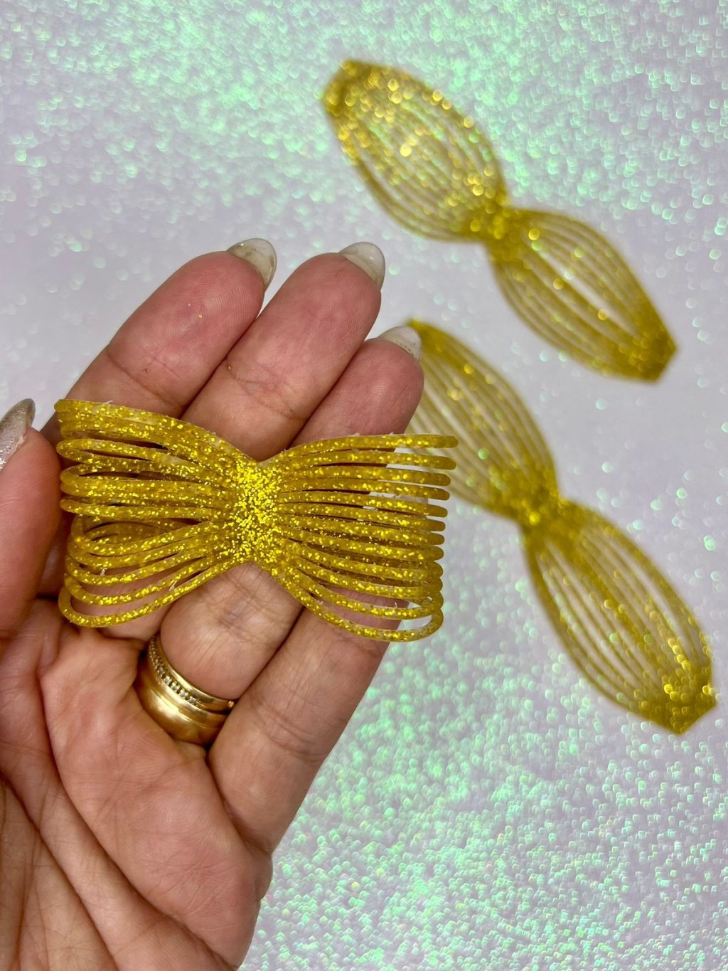 Aplique Emborrachado Laço Tira FrrImport Ref:43941 OURO 60mm 01und