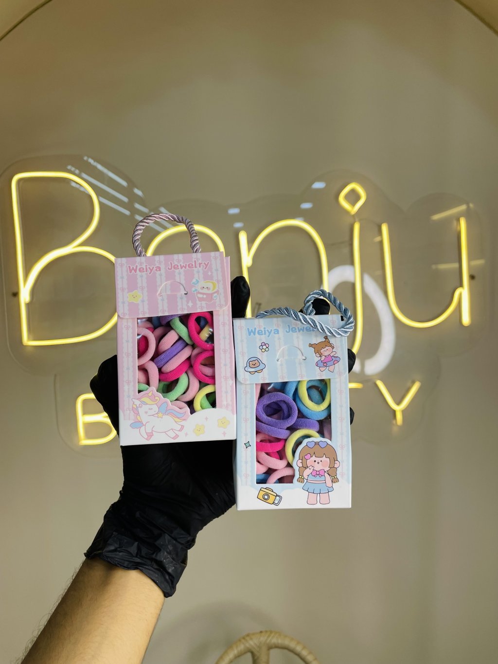 Mini bolsa com elásticos de cabelo 