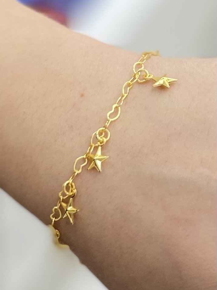 Pulseira de estrela dourada