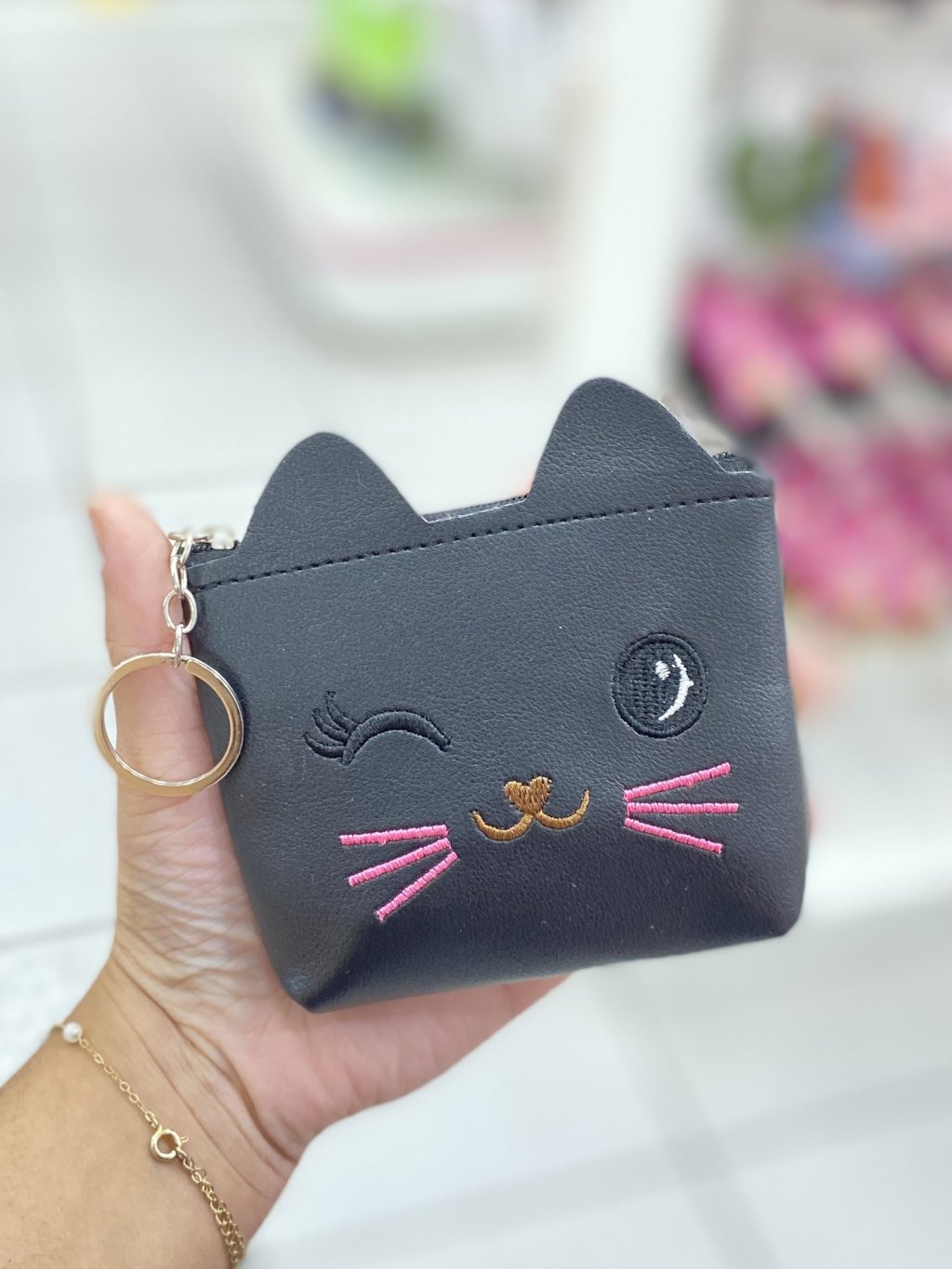 Niqueleira de gatinho preta