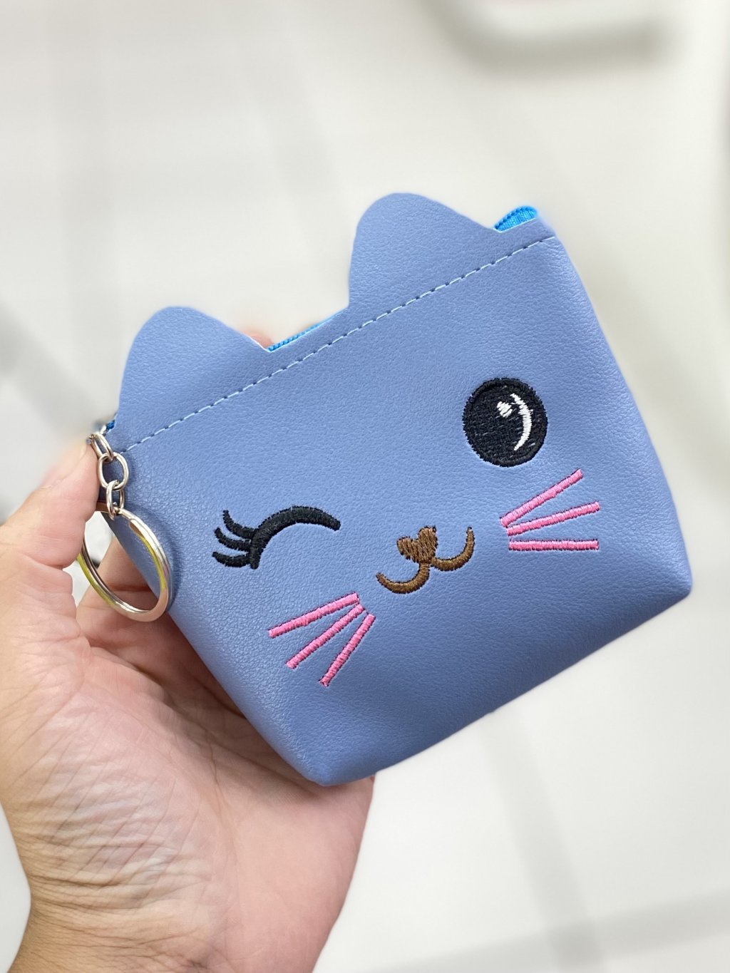 Niqueleira de gatinho azul