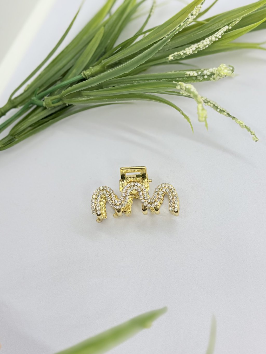 Piranha com strass dourada 