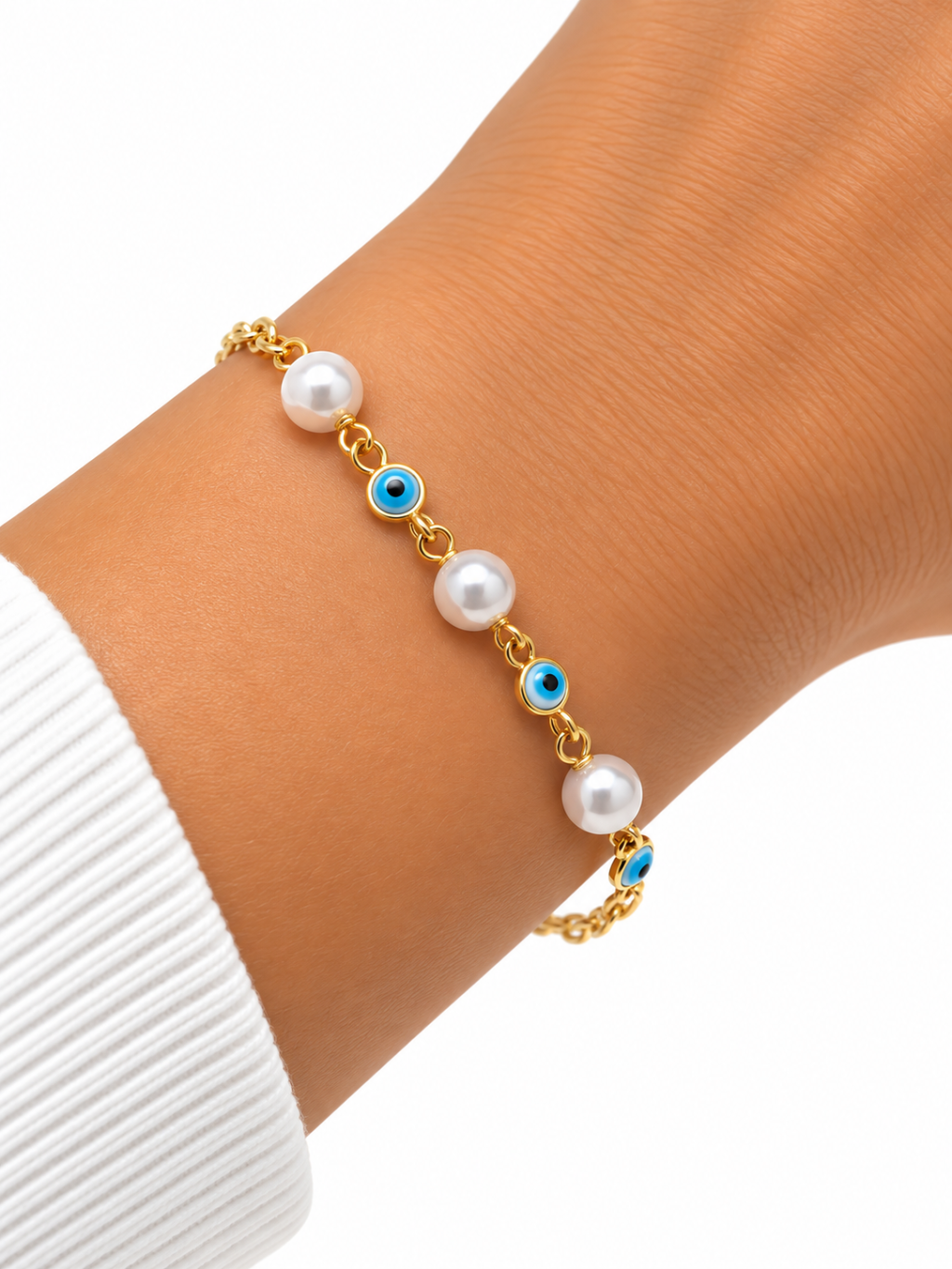 Pulseira semi joia dourada pérola com olho grego