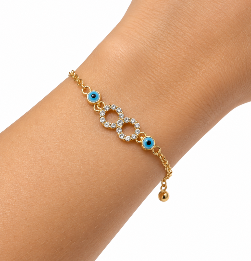 Pulseira semi joia dourada pingente infinito e olho grego 
