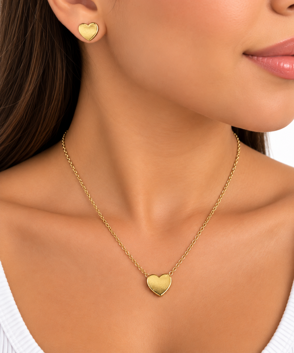 Conjunto folheado dourado de coração 