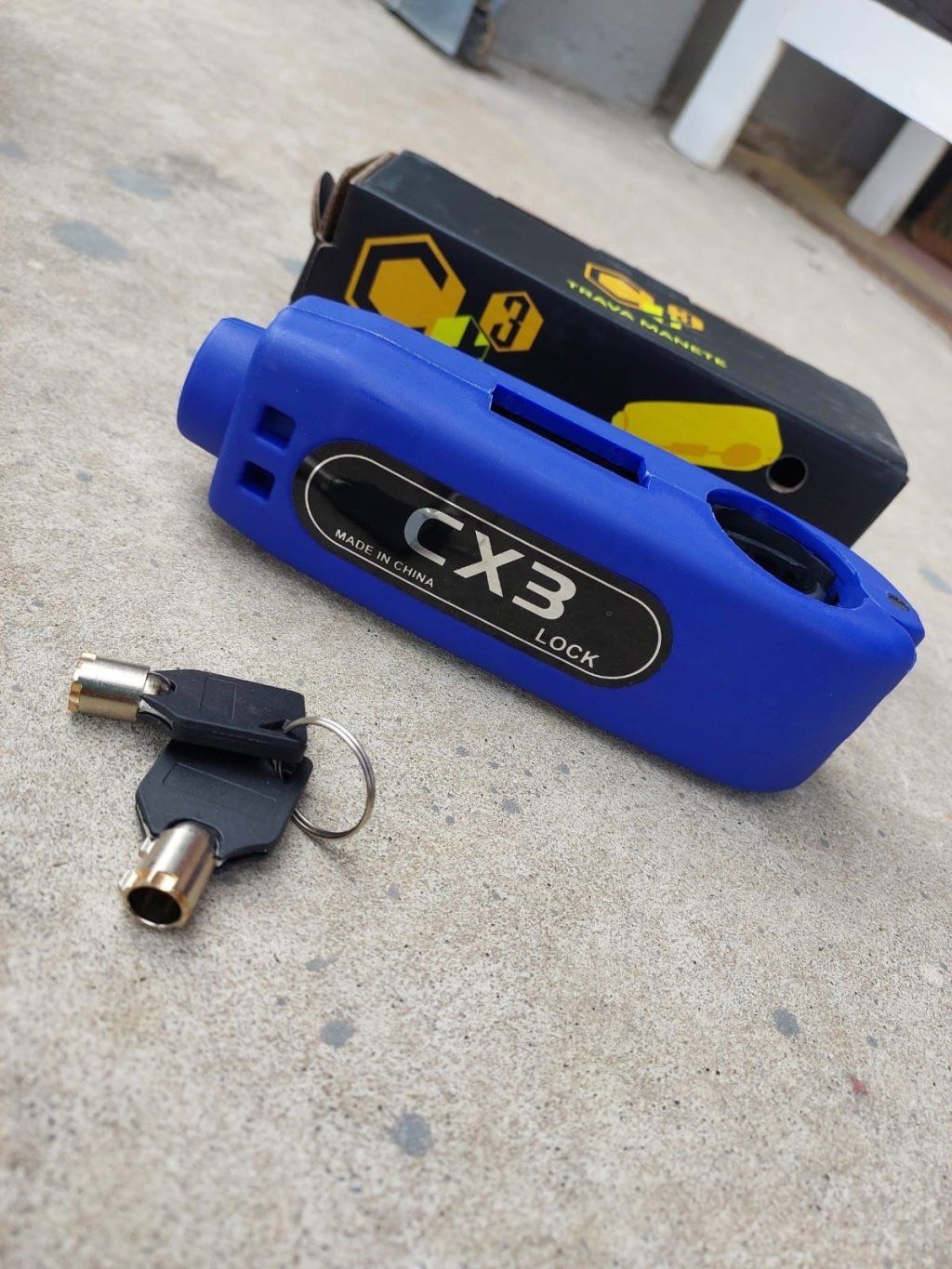 *TRAVA MANETE PLASTICO ABS AZUL