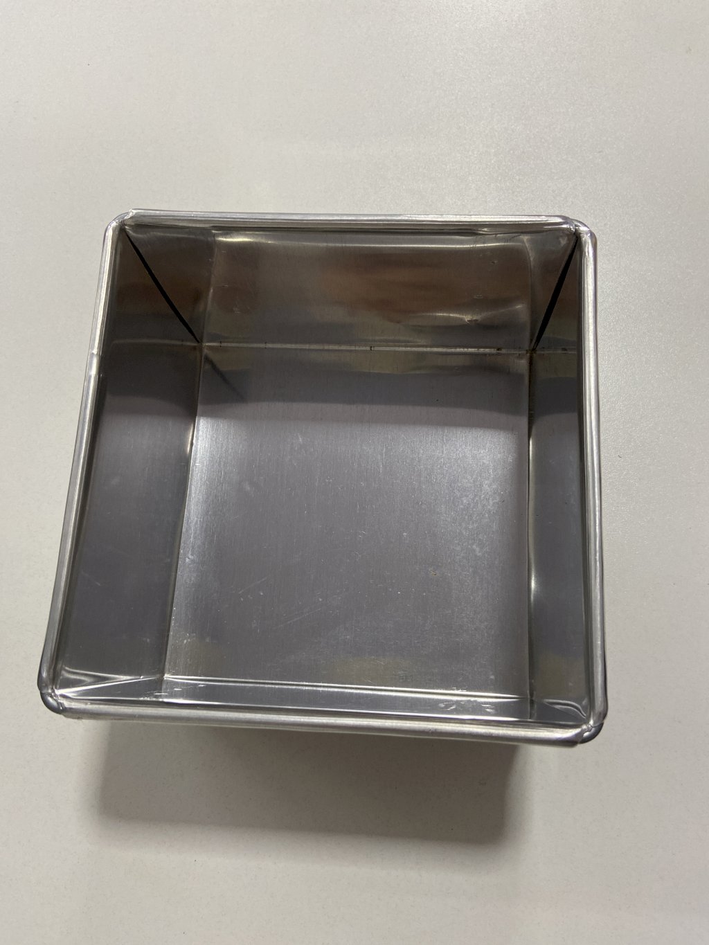 2888 - FORMA BOLO QUADRADA F. FIXO 15X10 - DONA LELLA