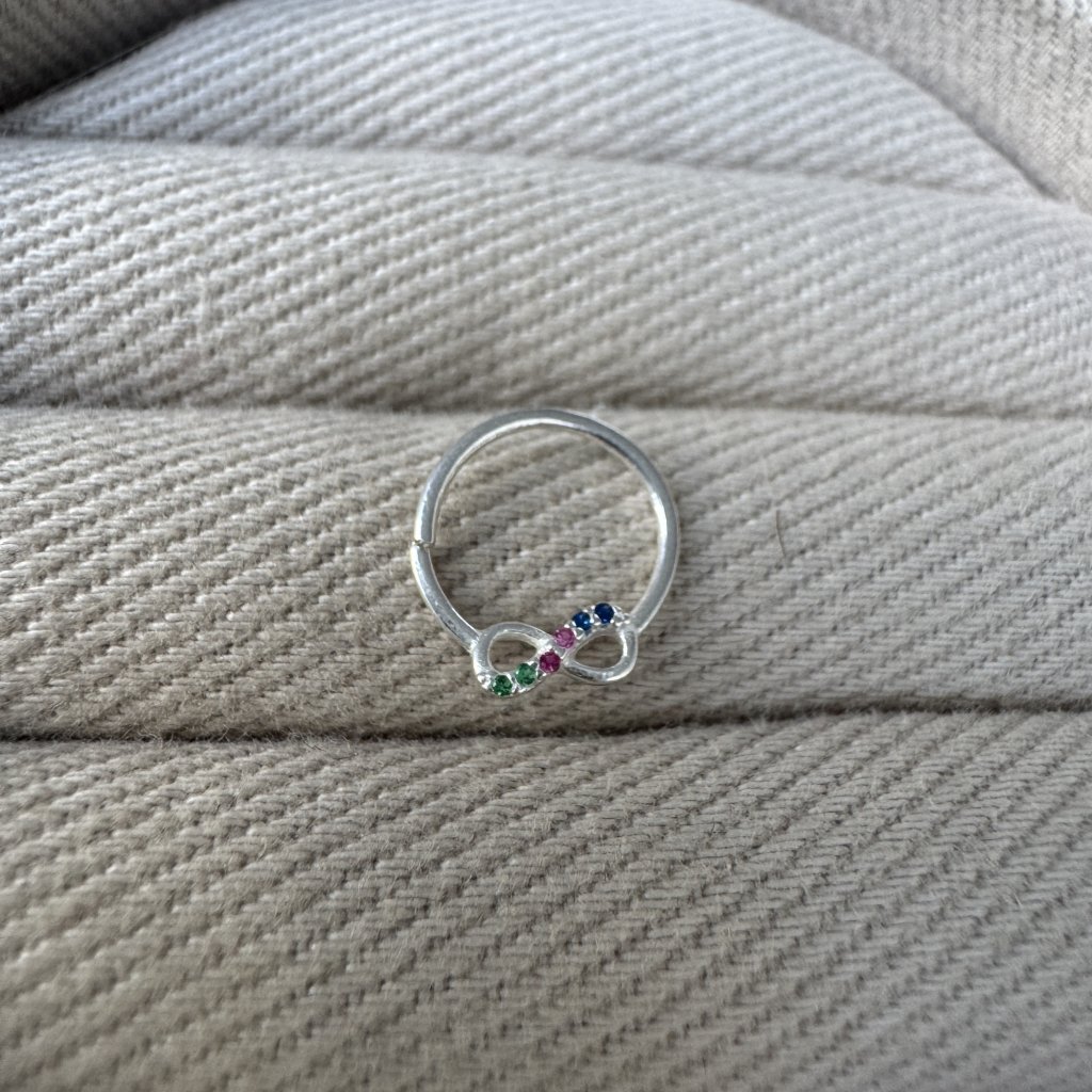 PIERCING ARGOLA INFINITO PEDRAS COLOR 1,1CM