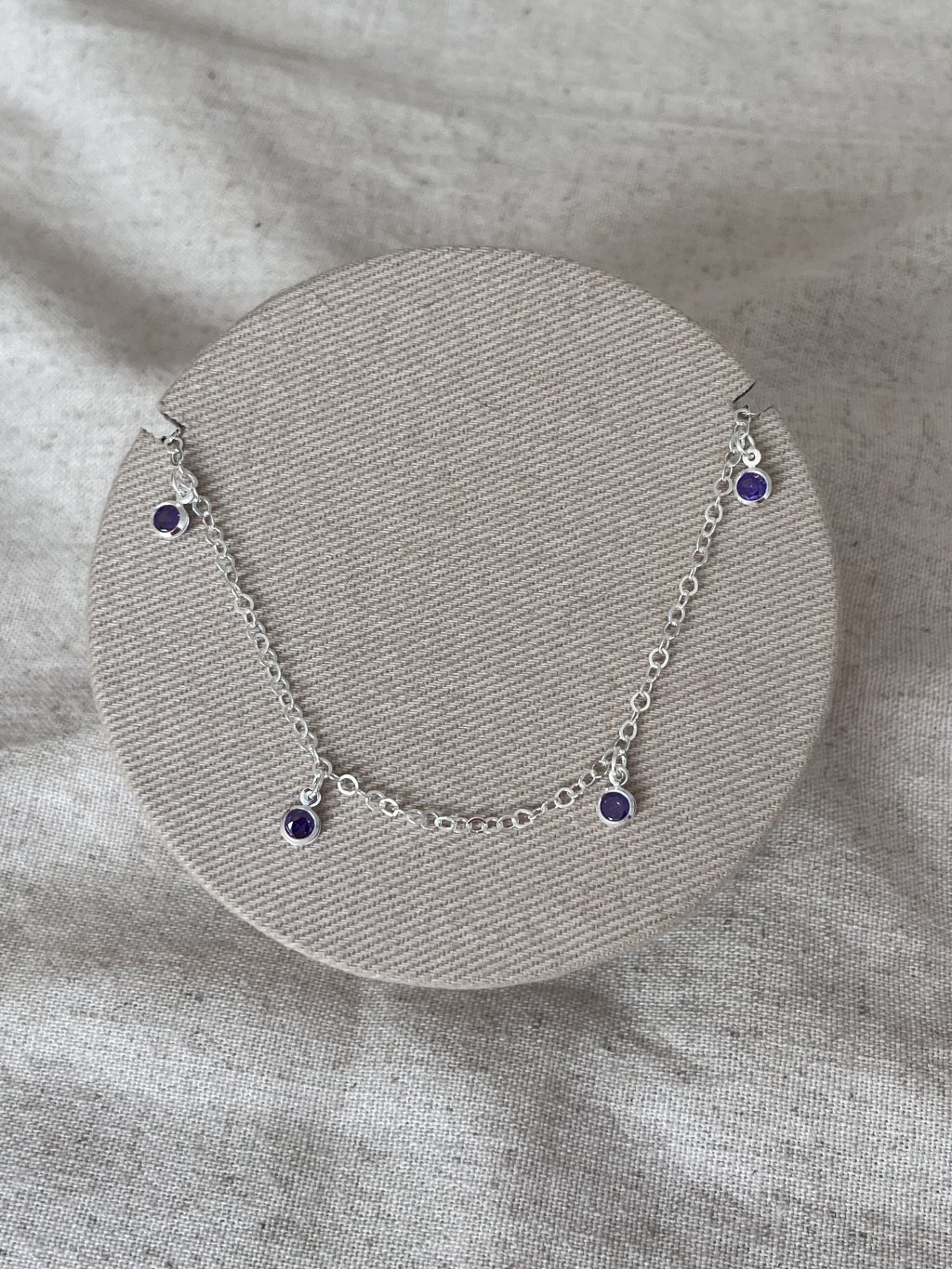 TORNOZELEIRA PEDRAS ROXAS DEPEND 25CM