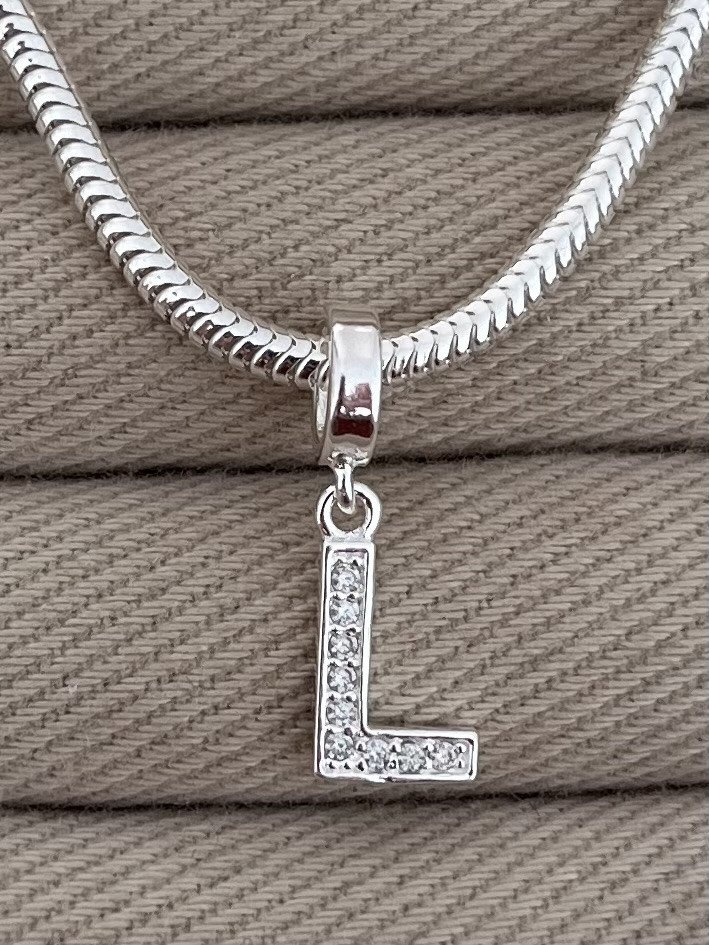 BERLOQUE LETRA L CRAVEJADA 