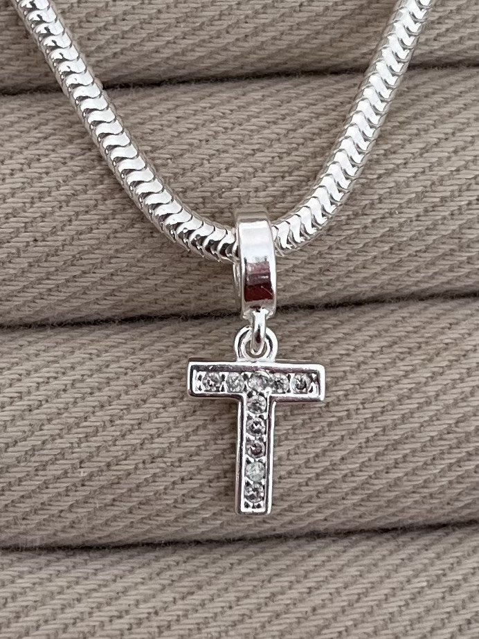 BERLOQUE LETRA T CRAVEJADA 