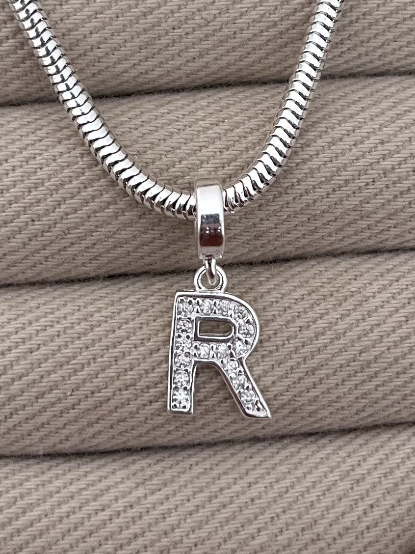 BERLOQUE LETRA R CRAVEJADA 