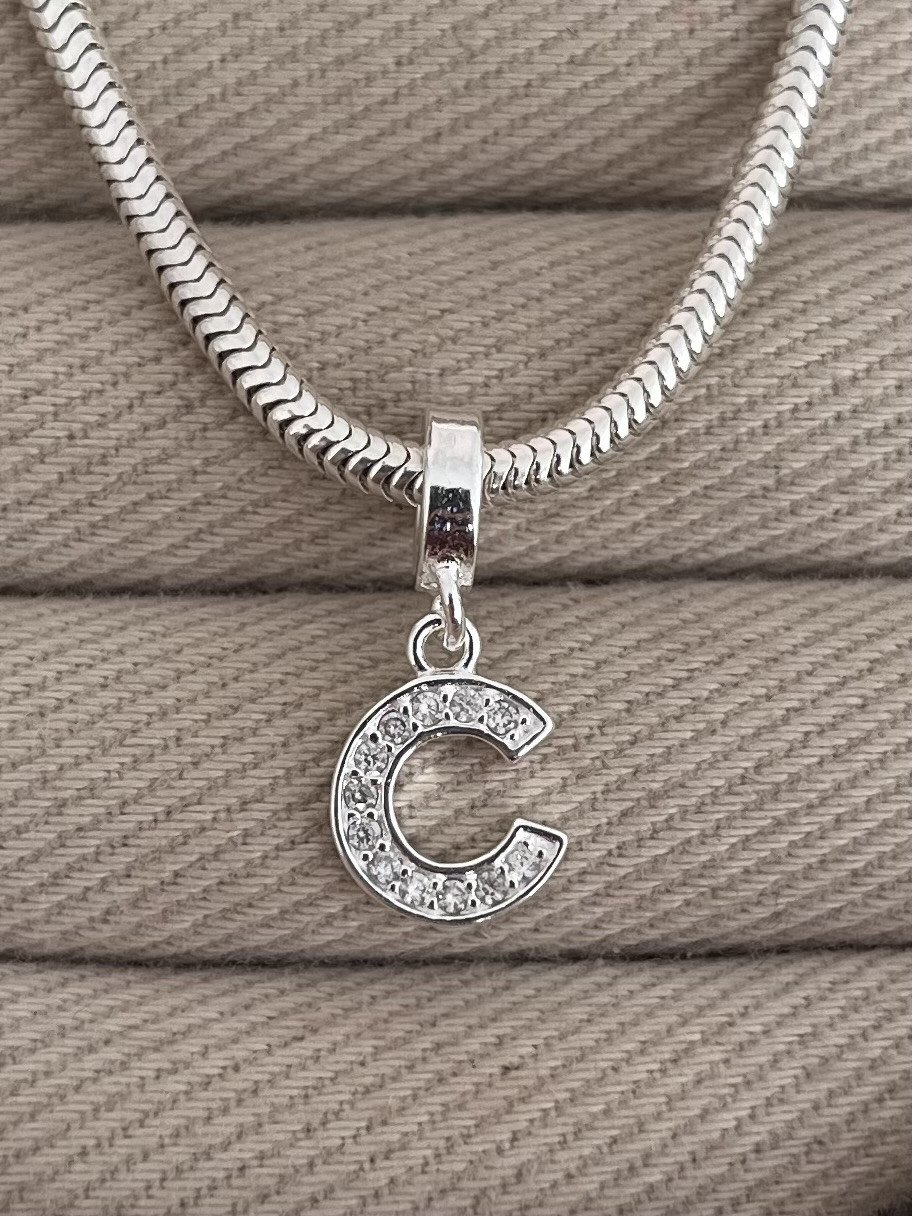 BERLOQUE LETRA C CRAVEJADA 