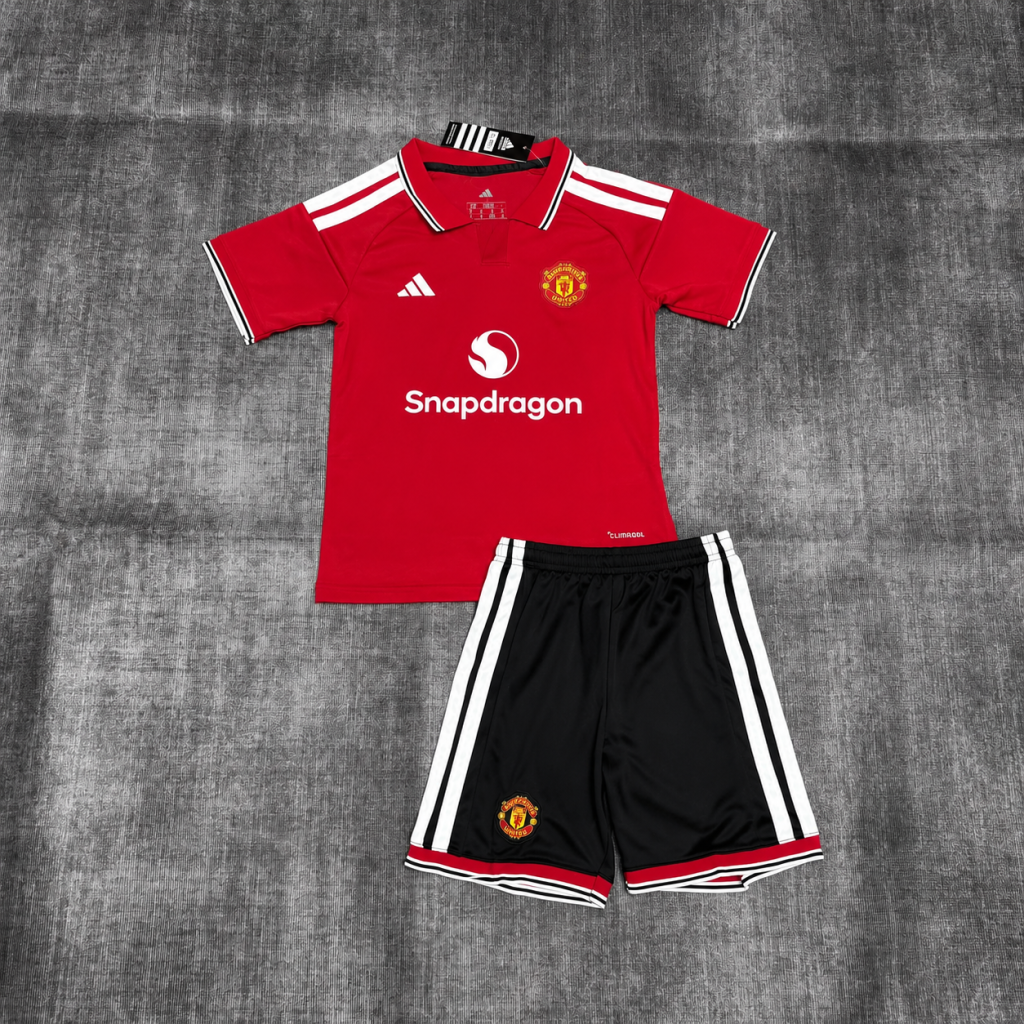 KIT INFANTIL MANCHESTER UNITED I 2026/27