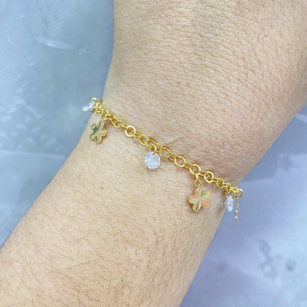 Pulseira dourado folheado flor e ponto de luz ✨