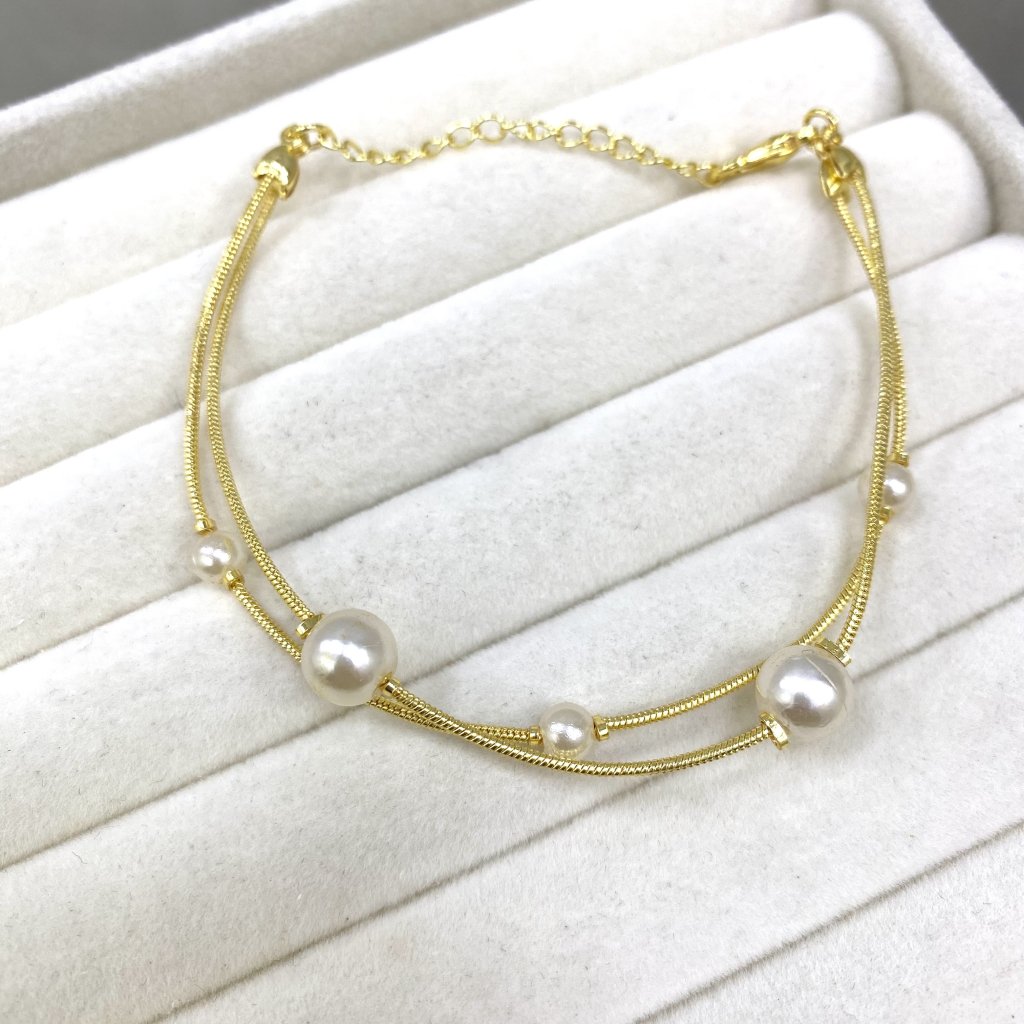 Pulseira duo folheado dourado fio mini pérola e pérola média ✨