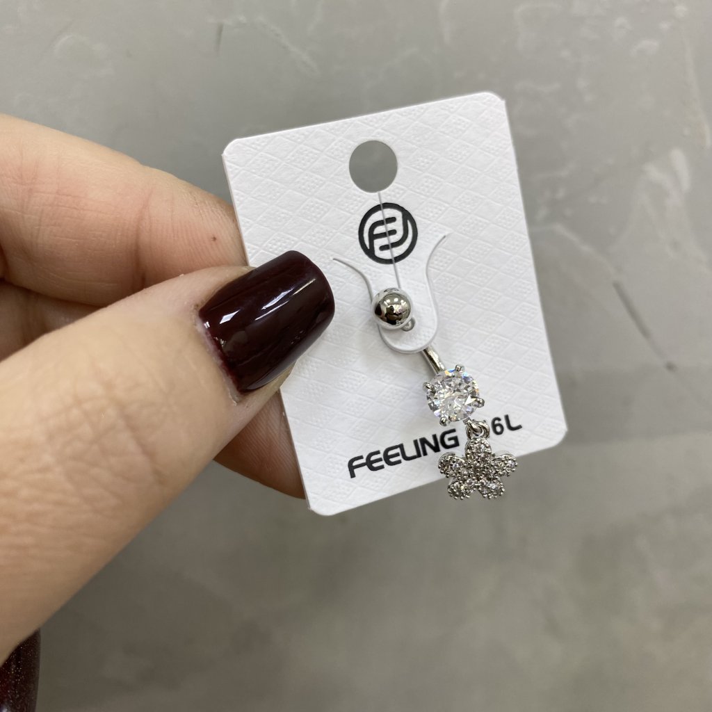 Piercing de umbigo ponto de luz e flor cravejada ✨