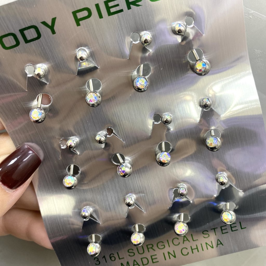 Piercing de umbigo em aço inox ponta dupla com pedrinha furta-cor ✨