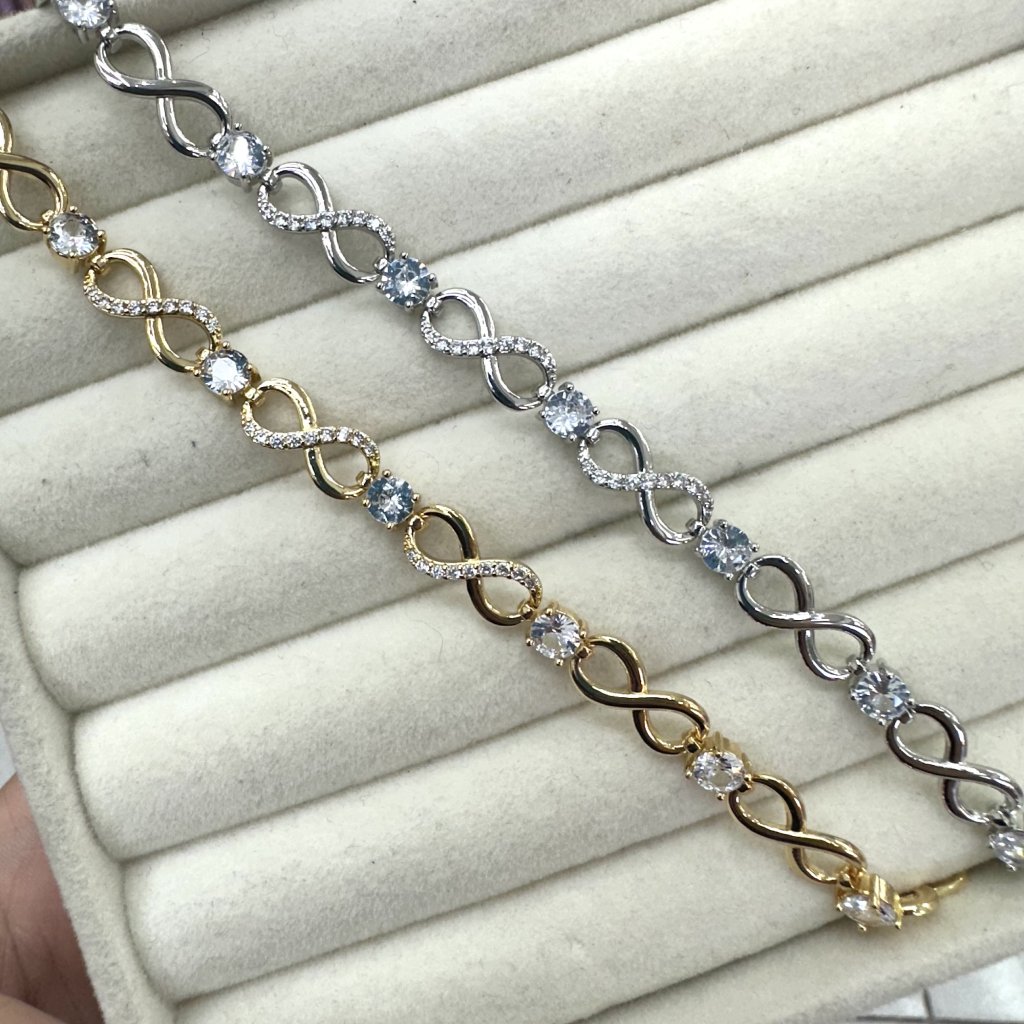 Pulseira bijoux fina Modelo Elos infinito cravejado e ponto de luz ✨