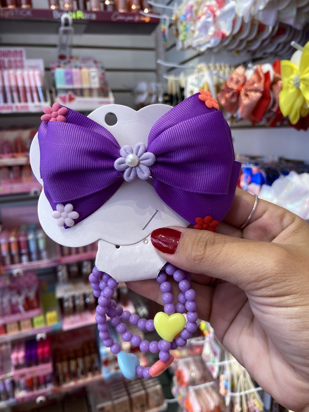 Laço com pulseiras roxa 