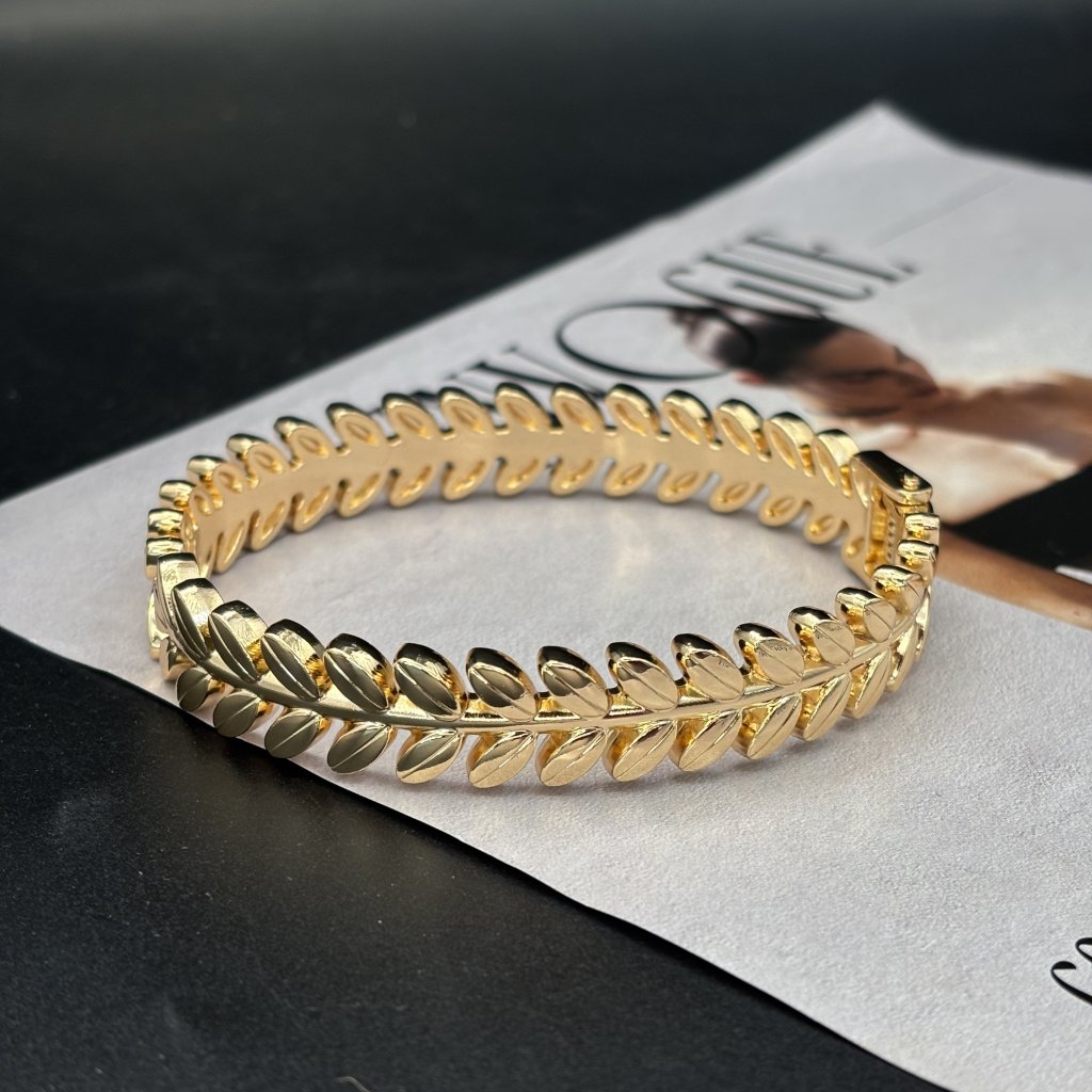 Bracelete folhas dourada 