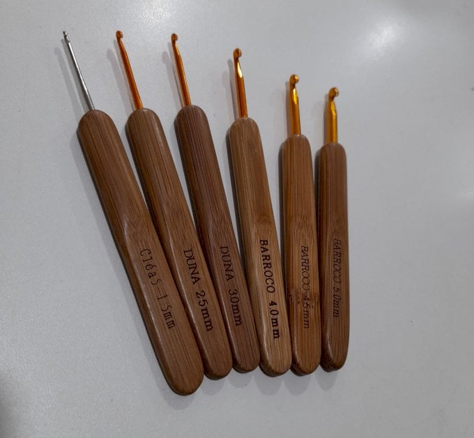 Agulha circulo cabo madeira 