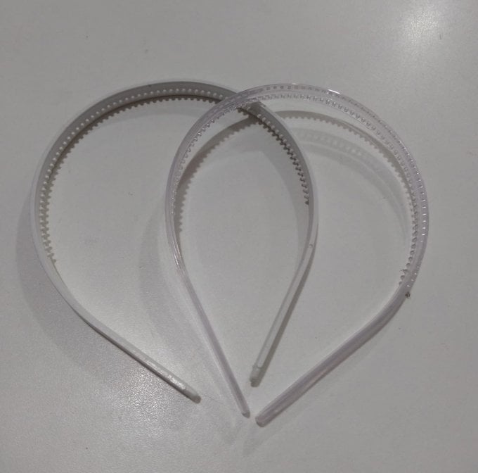 Tiara dentinho branca e transparente