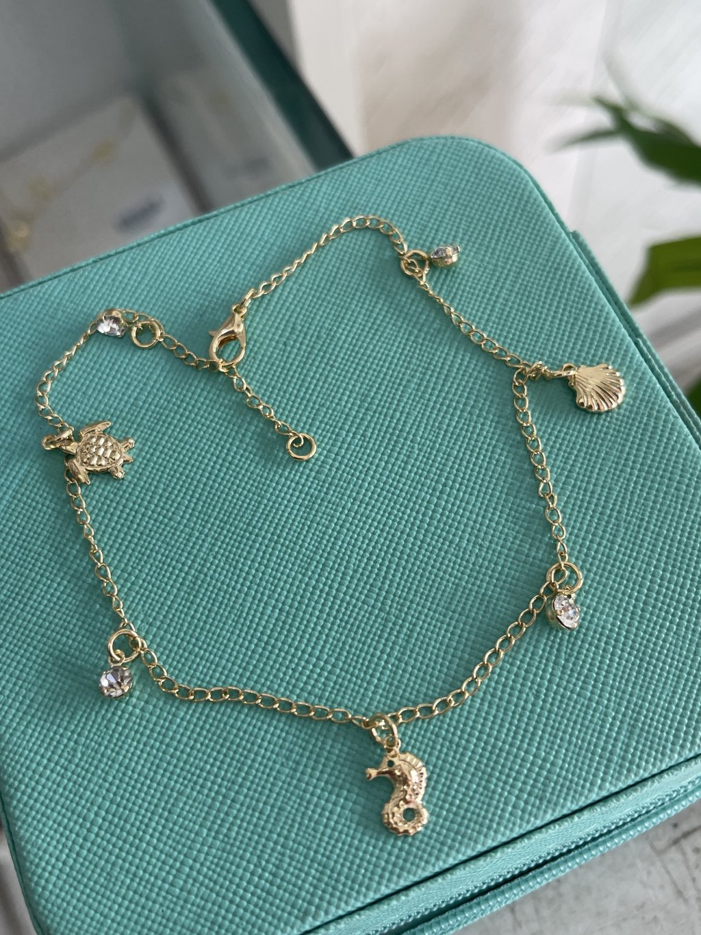 Tornozeleira mar ouro/prata