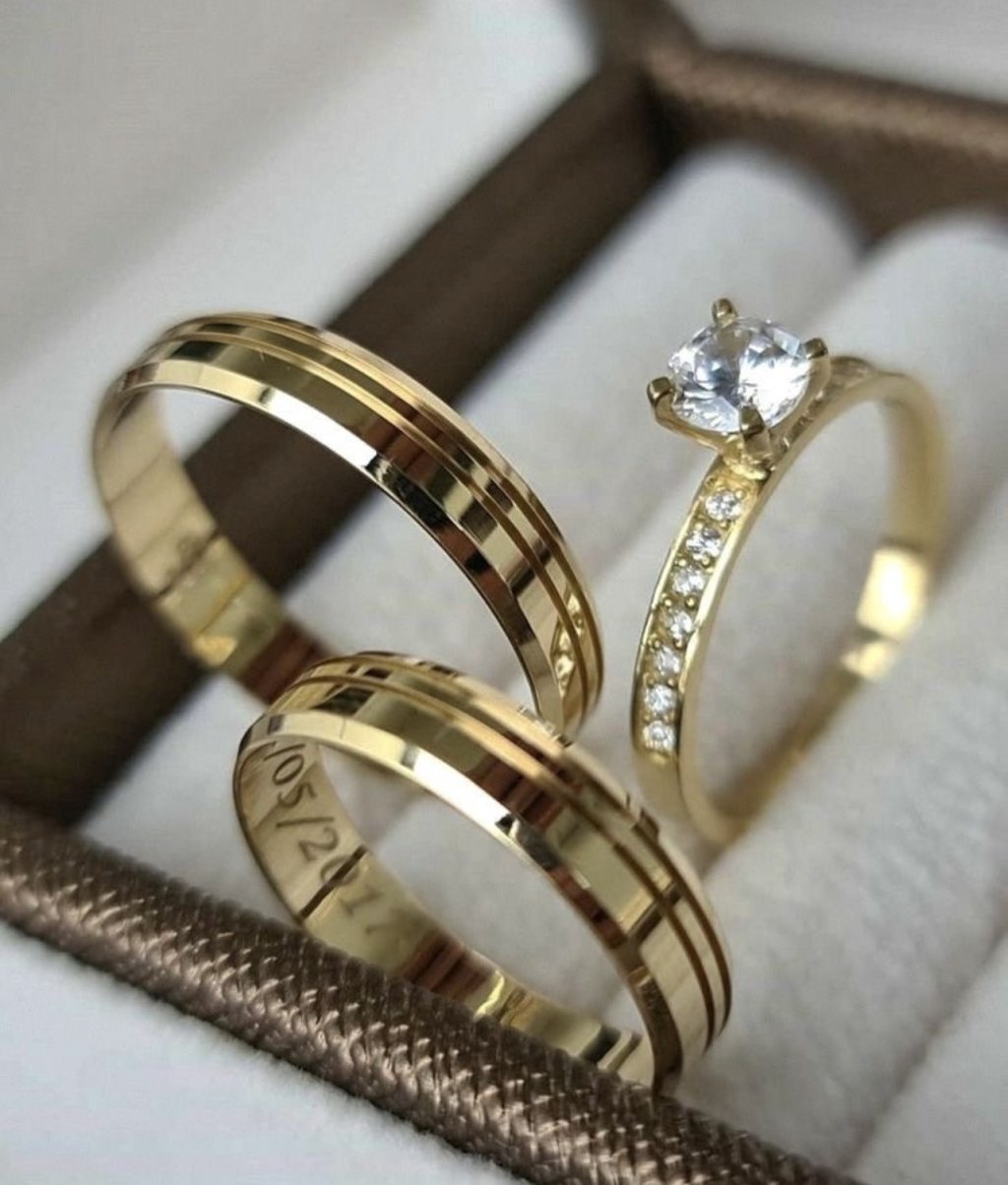 Aliança Liga de moeda + solitário com pedraria lateral 