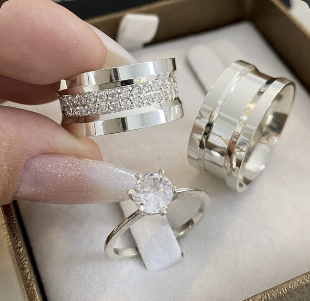 Par de alianças prata + solitário 