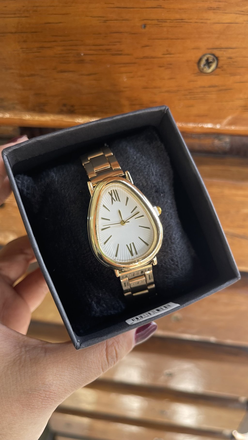 Relógio gota dourado