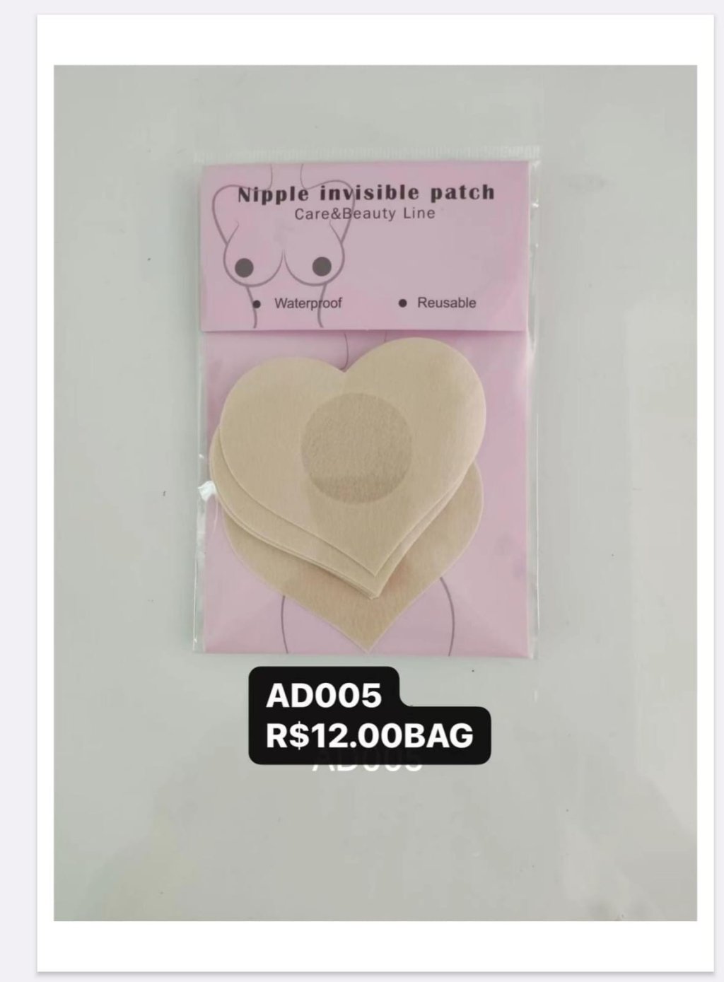 AD005 - Tapa Seio