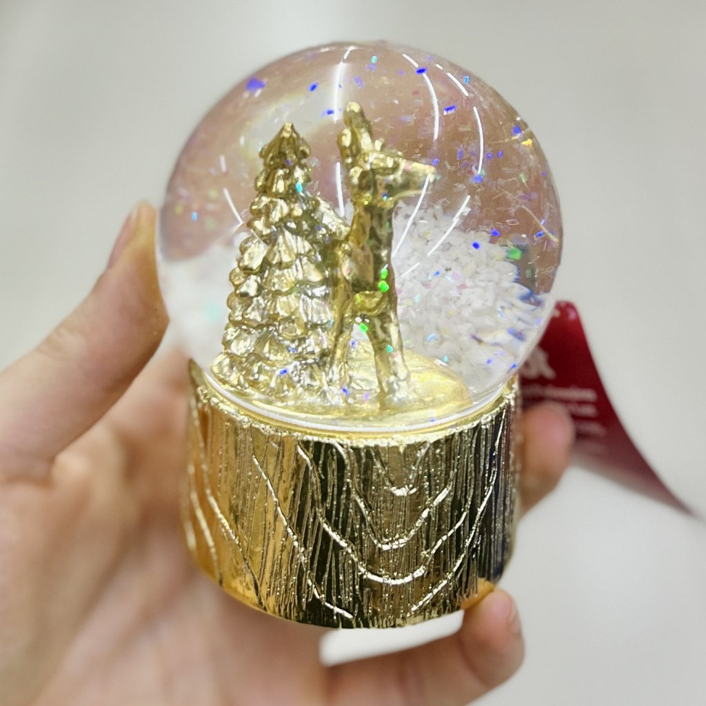Globo de neve dourado com Led 