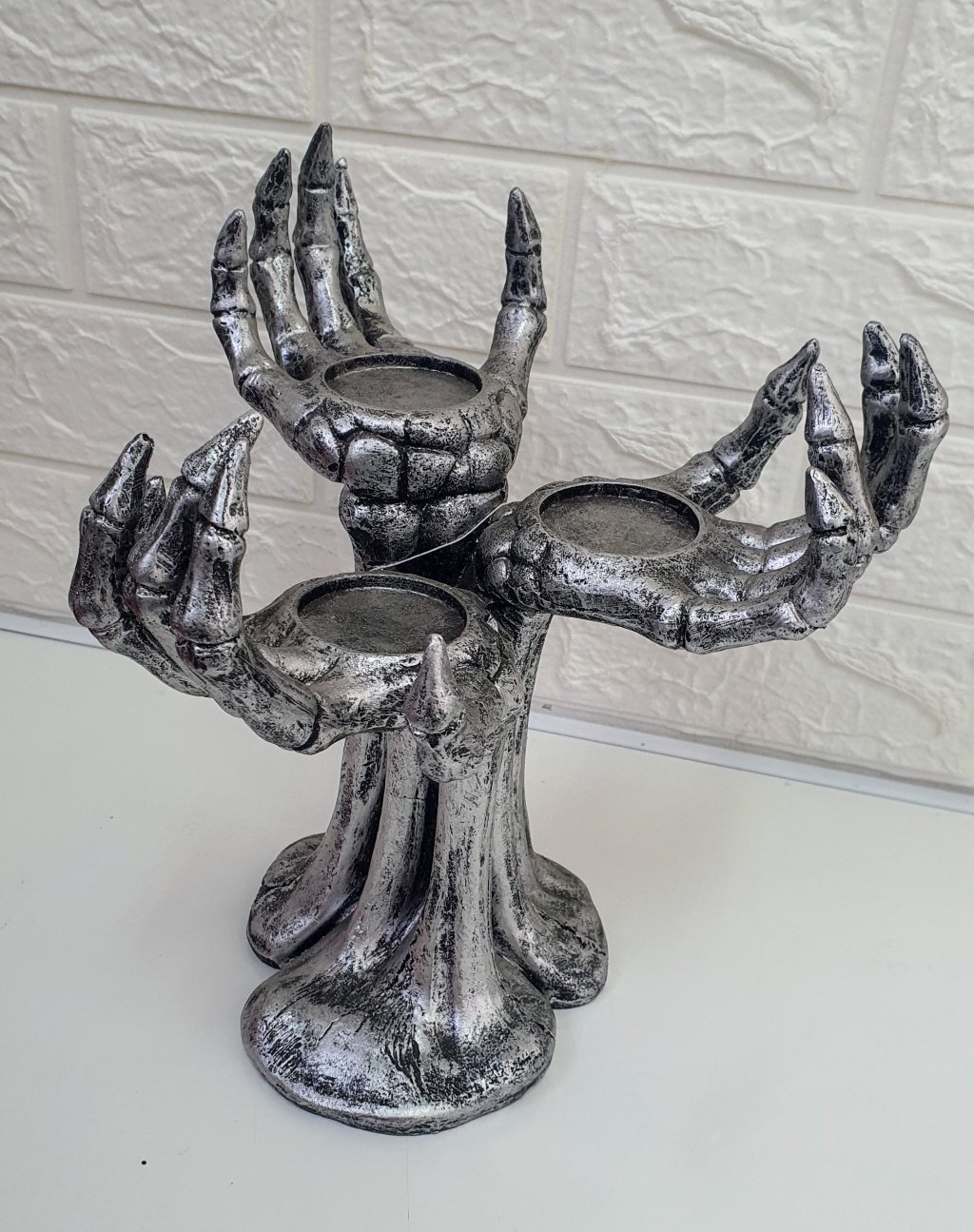 Castiçal de mãos 